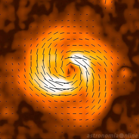 Emisión polarizada a gran escala en las ondas de radio provenientes de la galaxia IC 342, observada en una longitud de onda de 6 centímetros. El campo visual de la imagen es de 0,75° por 0,75°, y el diámetro angular de la galaxia, de 0,5°, es comparable al de la Luna llena en el firmamento terrestre. Las líneas negras muestran la orientación de las líneas del campo magnético. Créditos: R. Beck, MPIfR / NRAO.